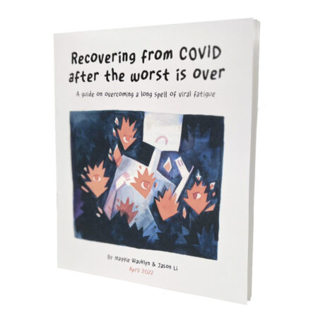 A zine on a white table. The zine is titled Recovering from COVID after the worst is over: A guide on overcoming a long spell of viral fatigue. Underneath the title is an abstract drawing of a person frowning next to spiky orange floaty things with eyes.